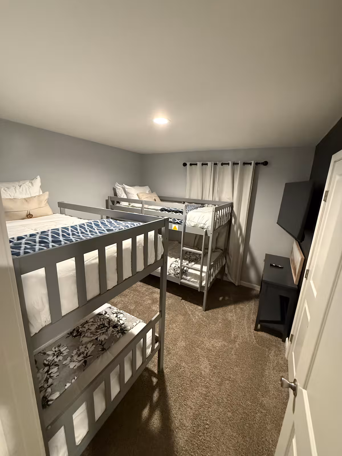 Bunk room with two bunk beds — sleeps four at Pine River Ranch